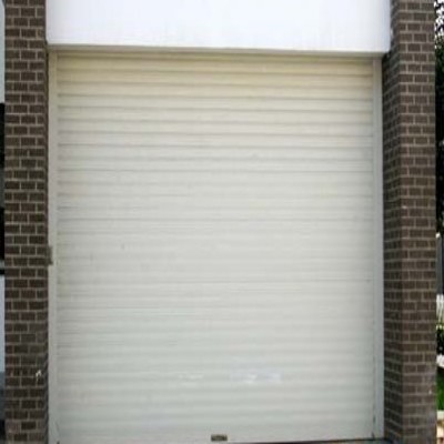 通州區(qū)安裝電動卷簾門北京東關安裝電動卷簾門更換電機